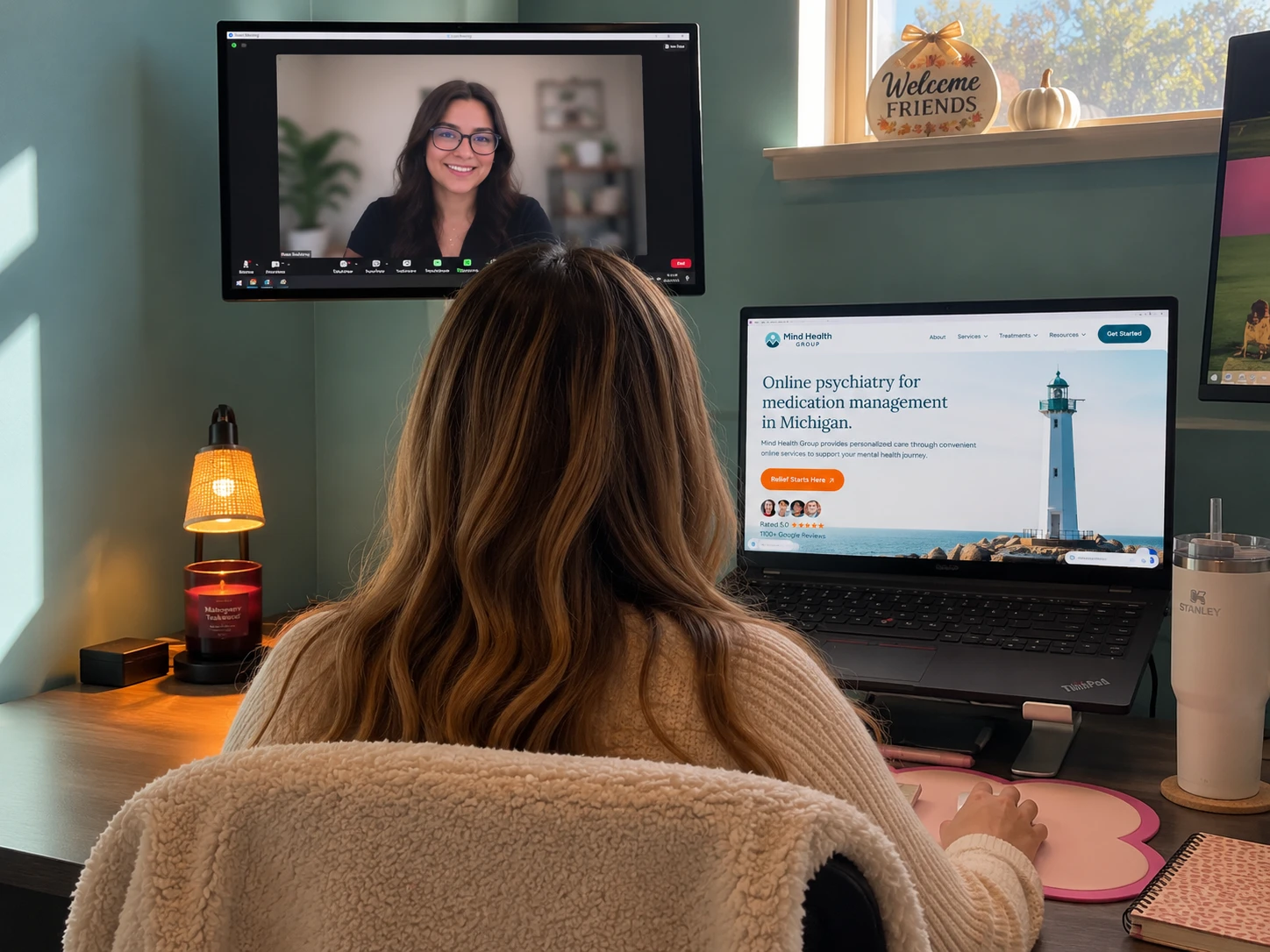 Woman at home on a video visit with her Mind Health Group provider